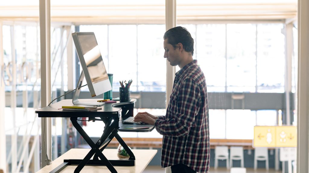 Man working while standing