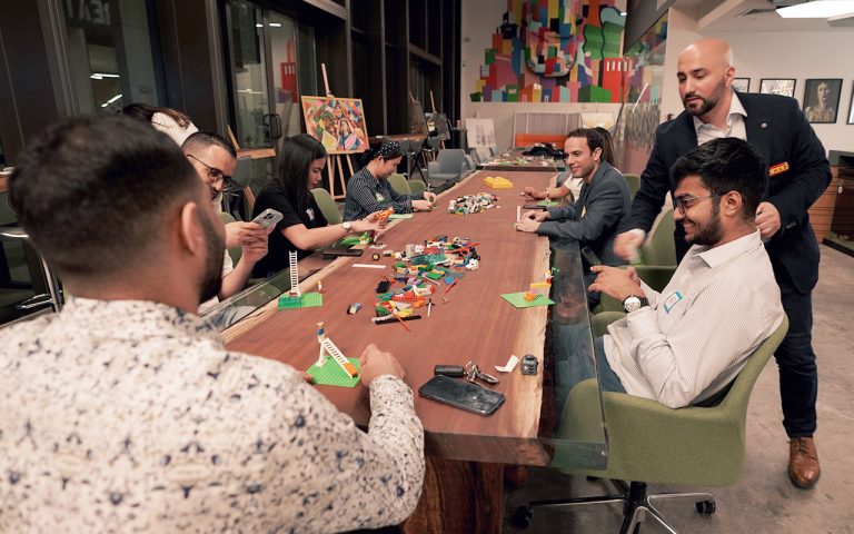 People in a Lego Workshop