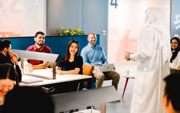 Diverse team working on a coworking space.